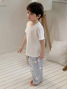 Dazy Kids Conjunto de pijama de niño pequeño con top de manga corta de cuello redondo de unicolor y pantalones a cuadros para verano - Blanco - Ver 4