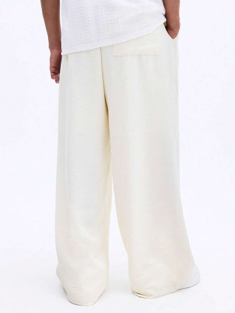 Pantalones de lino con pliegues y pierna ancha para hombres, de ajuste relajado, pantalones casuales de verano con cordón en la cintura y puños elásticos, para vacaciones y uso en la playa