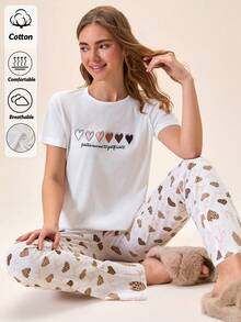 Bộ đồ nữ Cotton Line gồm áo tay ngắn cổ tròn màu trơn họa tiết trái tim và quần dài. - Màu be - Xem 1