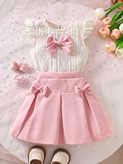 Conjunto casual de vacaciones para niña con camiseta de manga corta con decoración de lazo y falda mini plisada