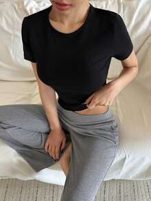 DAZY Women's Minimalist Fitted Cropped Top And Flared Pants Pajama Set - Black - View 6