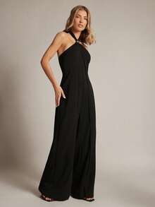Hauture Women's Halter Neck Flyaway Panel Stretch Jumpsuit With Hardware Trim - Black - View 5