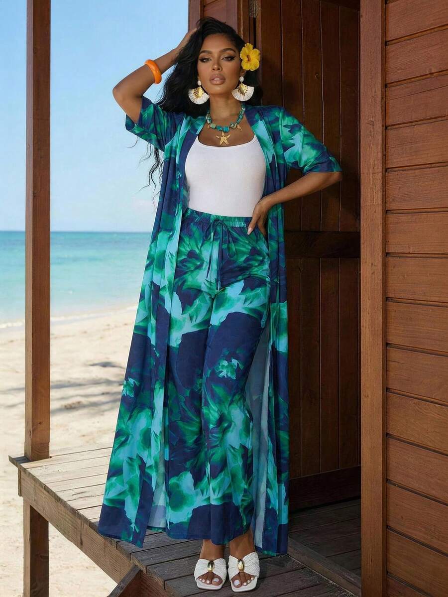 SHEIN Lady Bộ đồ nữ thời trang thường ngày in họa tiết toàn thân gồm áo khoác và quần, trang phục nghỉ dưỡng nhiệt đới cho nữ, áo khoác dài che phủ đồ bơi, bộ đồ đi biển cho nữ, bộ quần áo cho nữ, váy đi biển, trang phục đi chơi, trang phục nghỉ mát, bộ đồ thường ngày cho nữ, trang phục nghỉ dưỡng, đồ đi biển cho nữ, trang phục du lịch biển cho nữ, trang phục Hawaii, áo khoác maxi che phủ đi biển, váy maxi đi biển. - Nhiều màu - Xem 1