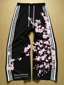 STEELVANCE Quần nỉ nam dáng rộng, in họa tiết hoa, có dây rút ở eo và sọc bên hông. - màu đen - Xem 4