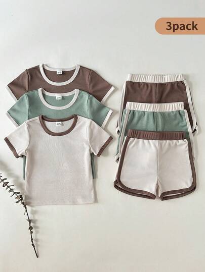 SHEIN Bộ 6 món áo ngắn tay và quần short phối màu thời trang cho bé trai, thích hợp cho hoạt động ngoài trời, thể thao và mặc hàng ngày.