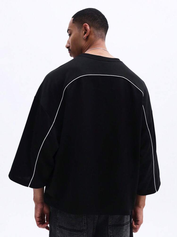 Oversized Tee With Curved Line Detail