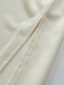 Elenzga Quần ống loe xẻ tà bên hông, chất liệu crepe có họa tiết, điểm nhấn nơ phía trước, kiểu dáng suông rộng rãi dành cho nữ. - Màu be - Xem 7