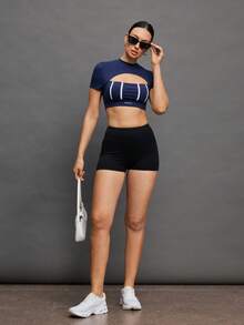 Activina Áo thun thể thao tay ngắn dáng lửng kẻ sọc khoét lỗ dành cho nữ - Dark Blue - Xem 5