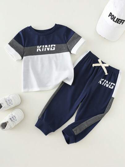 SHEIN 2pcs Baby Boy Casual Color Block Letter Print Round Neck Short Sleeve Top And Pants Set, Suitable For Commuting, School, Daily Casual Wear, Sports, Spring/Summer