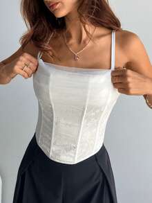 Aloruh 这款女士优雅雪纺混纺连衣裙采用白色立体面料，搭配精美褶皱胸罩、罩杯式上衣和紧身贴身连衣裙，胸部采用褶皱设计，肩带系有蝴蝶结。适合音乐会、乡村音乐会、夜总会和性感派对等场合。性感优雅的派对紧身连衣裙，搭配上衣。 - 白色 - 查看 12