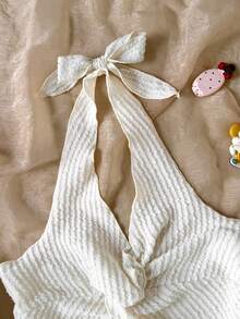 SHEIN Teen Girls Vacation Halter Tie Knot Hem Slit Open Back Halter Top, A-Line Slit Backless Tank Top, Mustard Black Textured Twist Front Frill Trim Fitted, Suitable For Summer, Vacation, Fashionable Occasions - Beige - View 3