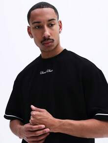SUMWON Ensemble coordonné classique t-shirt col rond noir et short avec passepoil contrastant blanc. Tenue de détente décontractée pour l'été - Noir - Voir 6