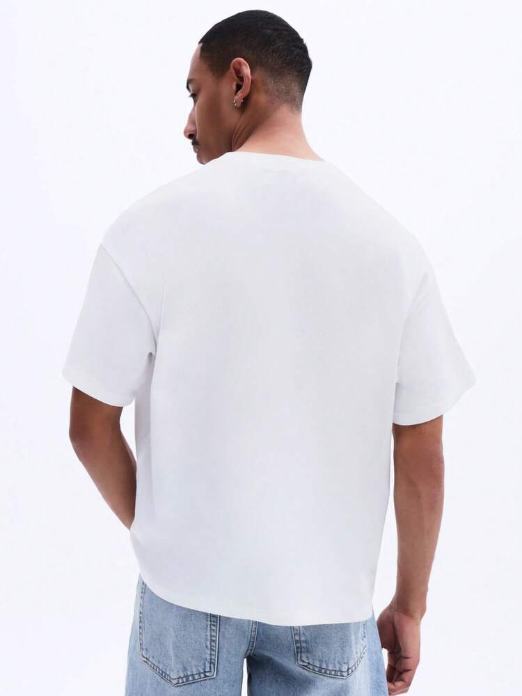 T-shirt coupe carrée à imprimé chaise de plage