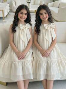 SHEIN Tween Girl Elegant Solid Apricot Organza Bow Decor Halter Neck Ruffle Hem A-Line Dress Elegant Solid Color Dress Cream Dress For Girls Ivory Dress For Girls Girls Bow Dress Girls Ruffle Trim Dress Picnic Dress Aesthetic Dresses For Summer Girls Ruffle Dress Girls Cream Girls Dress Ivory Dress Girls Beige Dresses For Girls Cream Dresses For Kids Ivory Or Champagne Dress For Tween Long Beige Dress Kids Girls Elegant Dress Soft Yellow Elegant Off-White Dress For Tweens - Apricot - View 9