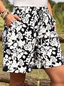 EMERY ROSE Pantalones cortos holgados de pierna ancha con estampado floral, cintura con cordón y bolsillos laterales, para mujeres de talla grande, ideales para el verano, vacaciones, primavera y playa, en estilo bohemio - Blanco y Negro - Ver 4
