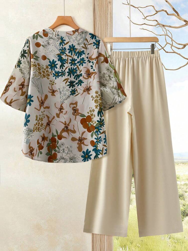Plus Size Floral Print Scoop Neck Short Sleeve Top And Solid Color Wide Leg Pants 2 Piece Set Summer Outfits Summer Clothes  Spring  Spring Outfit Women Spring Clothes Country Style For Women Vacation Outfits Women  Summer Holiday Outfits Women's Summer Two-Piece Sets  Women's Summer Set  Co Ords Sets Women Summer Women Spring Sets Women Vacation Outfit Sets