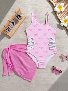 SHEIN Bộ đồ bơi liền thân cho bé gái, hoàn hảo cho kỳ nghỉ, phong cách thường ngày và dễ thương. Thiết kế có nơ hồng và họa tiết sọc, chất liệu vải dệt kim, kiểu dáng một vai và đường cắt xẻ bên hông. Đi kèm với chân váy tam giác màu hồng, thích hợp cho bơi lội, kỳ nghỉ hè, bãi biển và hồ bơi. - Hồng - Xem 5