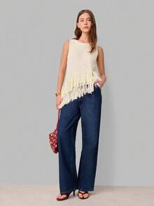 Nöista Áo dệt kim không tay có họa tiết chéo độc đáo với tua rua dài ở gấu áo. Màu kem nhẹ nhàng và thiết kế có chất liệu tạo nên vẻ ngoài boho-chic, hoàn hảo để mặc nhiều lớp hoặc phối cùng trang phục thường ngày. - Màu be - Xem 6