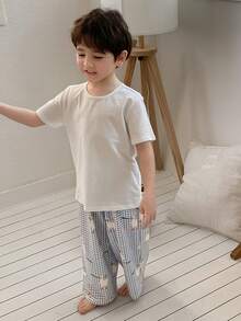 Dazy Kids Conjunto de pijama de niño pequeño con top de manga corta de cuello redondo de unicolor y pantalones a cuadros para verano - Blanco - Ver 3