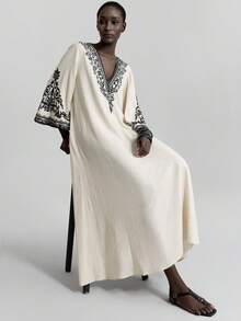 Ontre Đầm dài mùa hè mới 2026 dành cho nữ, màu trơn, thời trang, phù hợp cho mùa hè. Họa tiết thêu đen, phong cách Bohemian, tay chuông, đầm dài màu be rộng rãi và thoải mái, cổ chữ V, phù hợp cho tiệc tùng, kỳ nghỉ, khu nghỉ dưỡng trên đảo, lễ hội âm nhạc, đầm maxi mùa hè thanh lịch dành cho phụ nữ. - trắng - Xem 3