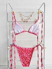 Swim Mod Bộ 2 món đồ bơi nữ thời trang và dễ thương, gợi cảm cho kỳ nghỉ biển, gồm áo bơi hở lưng họa tiết hoa nhí và quần bơi buộc dây bên hông. - Nhiều màu - Xem 2
