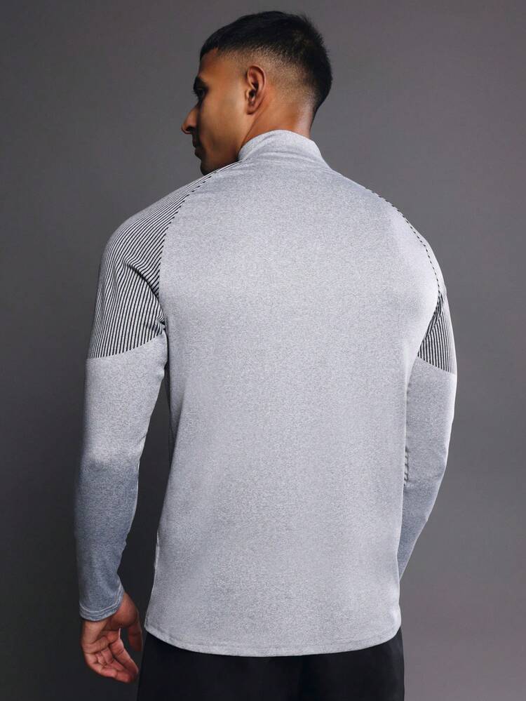 Bluzka z długim rękawem i suwakiem na pół i panelami w paski