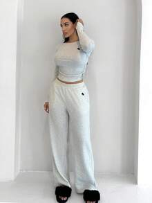 Shopreo Old Money Women's Round Neck Rib-Knit Long Sleeve Set With Animal Detail, Perfect For Everyday Comfortable Two Piece Set Long Sleeve Two Piece Set - Light Grey - View 1