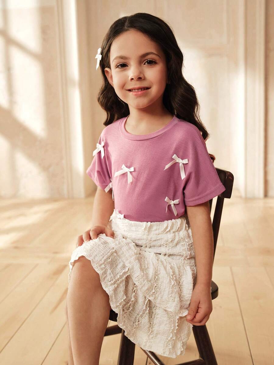 SHEIN Girls Loose Batwing Sleeve T-Shirt With 3D Ribbon Bow,White Double-Layer Cake Skirt Set,Korean Style Summer Family Matching Daily Wear Pink Outfits - Purple - View 1
