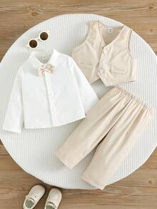 SHEIN Bộ đồ 3 món cho bé trai/bé gái màu trắng kiểu quý ông gồm áo sơ mi dài tay, áo phông, áo vest và quần, trang phục thanh lịch phù hợp cho mùa xuân/hè, ở nhà, đi chơi, tiệc sinh nhật, lễ rửa tội, sinh nhật lần thứ nhất, lễ kỷ niệm, khách dự đám cưới, phù rể, người giữ nhẫn. - Màu be - Xem 9