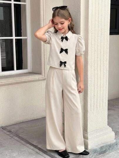 少女休闲时尚翻领泡泡袖上衣和裤子套装，杏色和卡其色撞色蝴蝶结装饰套装
