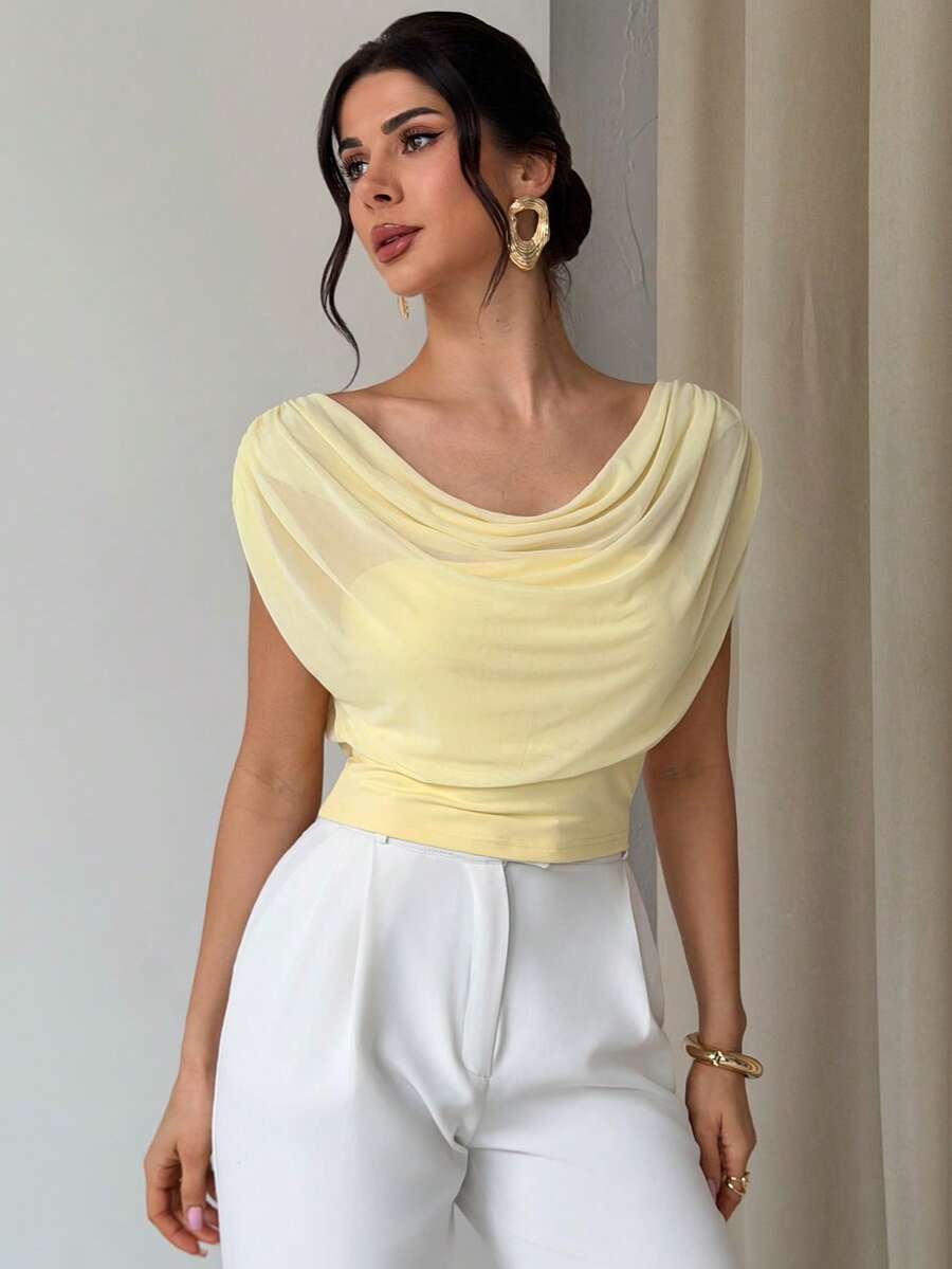 Firerie Áo thun nữ màu vàng nhạt dáng ôm, cổ bèo nhún, chất liệu lưới, thích hợp cho đi làm, đi nghỉ mát, hẹn hò lãng mạn. Phù hợp cho giáo viên, sân bay, đi chơi, đi nghỉ mát sang trọng.
