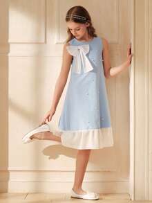 SHEIN 女童圆领3D大蝴蝶结珍珠装饰A字连衣裙。纯色大蝴蝶结，精致可爱，经典A字廓形，适合各种宝宝体型。无论是日常外出、居家休闲还是参加派对，都能让您的宝宝成为闪耀的小公主。也是妈妈们精心挑选的理想时尚单品。 - 彩色 - 查看 9