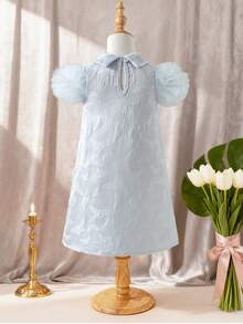 SHEIN Đầm mini dáng rộng màu xanh dương tay phồng cổ tròn họa tiết hoa, chất liệu mềm mại, co giãn, thích hợp cho kỳ nghỉ hè 2026, dành cho bé gái. - Màu xanh lam - Xem 2