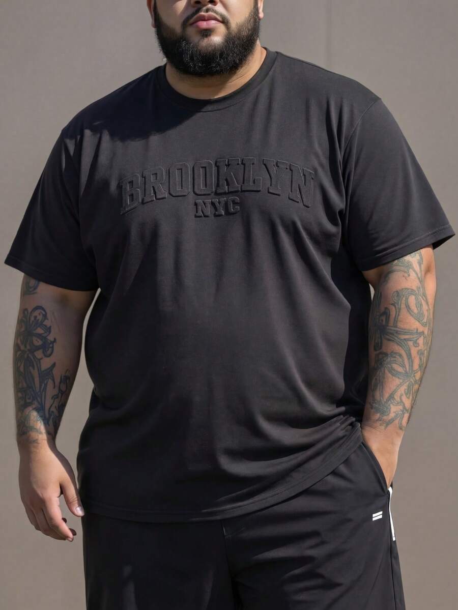 ResortEase 大码男士短袖连体衣，oversize，男士休闲简约字母标语刺绣工艺T恤，宽松落肩休闲短袖T恤，浅卡其米色麂皮纹理面料T恤，年轻街头潮流，热销，送给男朋友的礼物，年轻休闲运动街头日常通勤百搭返校度假装，送给男朋友和老公的礼物首选，情侣装 - 黑色 - 查看 1