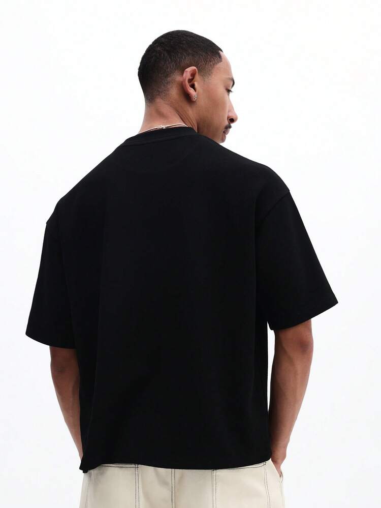 T-shirt à col ras-du-cou à manches courtes avec logo de marque, coupe régulière, style décontracté pour l'été