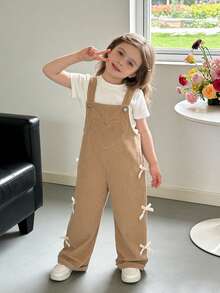 SHEIN ChillGRL Quần yếm kaki phong cách thường ngày cho bé gái có nơ trang trí, ống thẳng rộng rãi, vải mềm mại và thoải mái, đa năng cho mặc hàng ngày, đi học, đi làm, xuân/hè/thu/đông - Màu Khaki - Xem 8