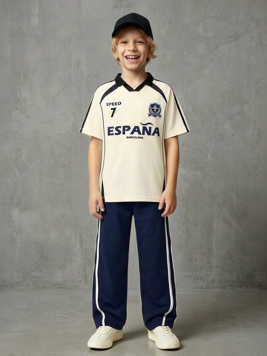 Casuvi Kids Loose Fit Navy Blue Casual Sports Pants For Tween Boywith Two White Stripes On Sides, "CALIFORNIA" Text, And Oval "CAx" Logo Graphic, Suitable For School, Sports, And Casual Weekends Kids Sports Wear - Navy Blue - View 1