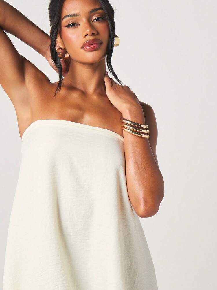 MISSGUIDED Robe mini asymétrique drapée sans bretelles avec détail de volant sur le côté. Tenue élégante pour cocktail, fête, mariage d'été