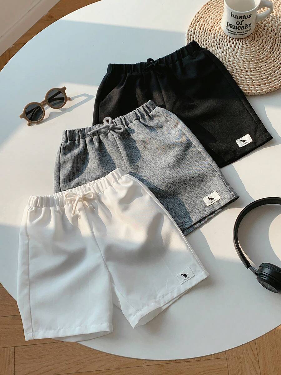 SHEIN 3件套男童休闲纯色弹力腰抽绳短裤,恐龙印花拼接套装夏季男童短裤 - 彩色 - 查看 1