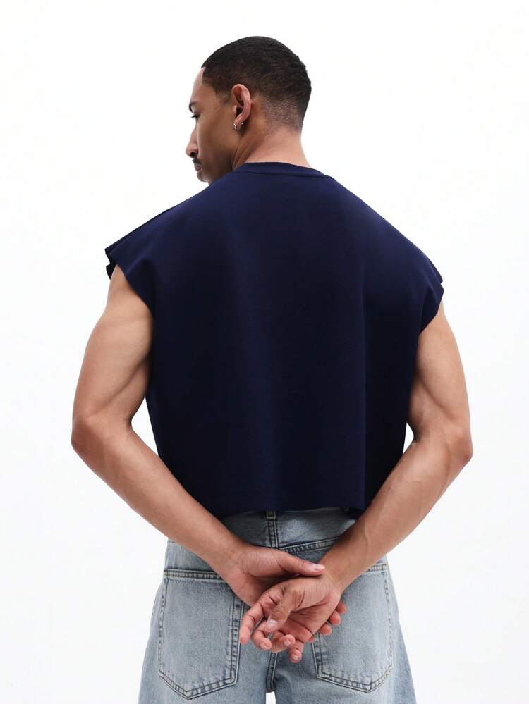 Débardeur sans manches pour hommes en bleu marine avec logo brodé en script, col rond, coupe régulière, pour un port décontracté en été