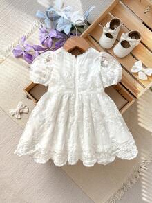 Cozy Pixies Đầm in hoa cho bé gái, cổ tròn, tay cánh hoa, eo thắt. - trắng - Xem 2