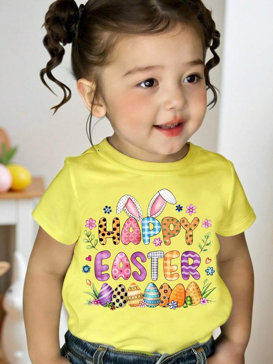 SHEIN Maglietta basic a maniche corte con stampa grafica di conigli, pois, fiori, cuori, uova e plaid, in stile casual e creativo, adatta per bambine, in atmosfera pasquale, comoda e alla moda per la primavera e l'estate - Giallo - Visualizzare 1