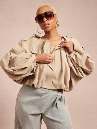 Vixey Chaqueta ligera con cremallera, mangas de globo de murciélago y bajo de tejido sólido