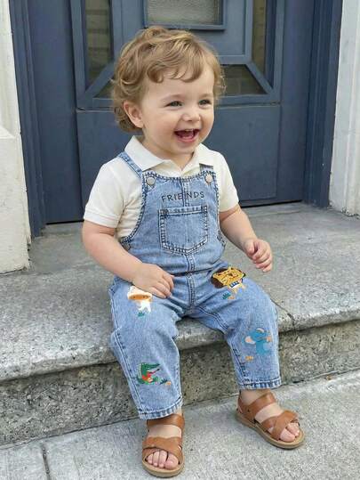 SHEIN Pijama de una pieza con estampado de animales para niños pequeños, ajuste holgado en azul denim