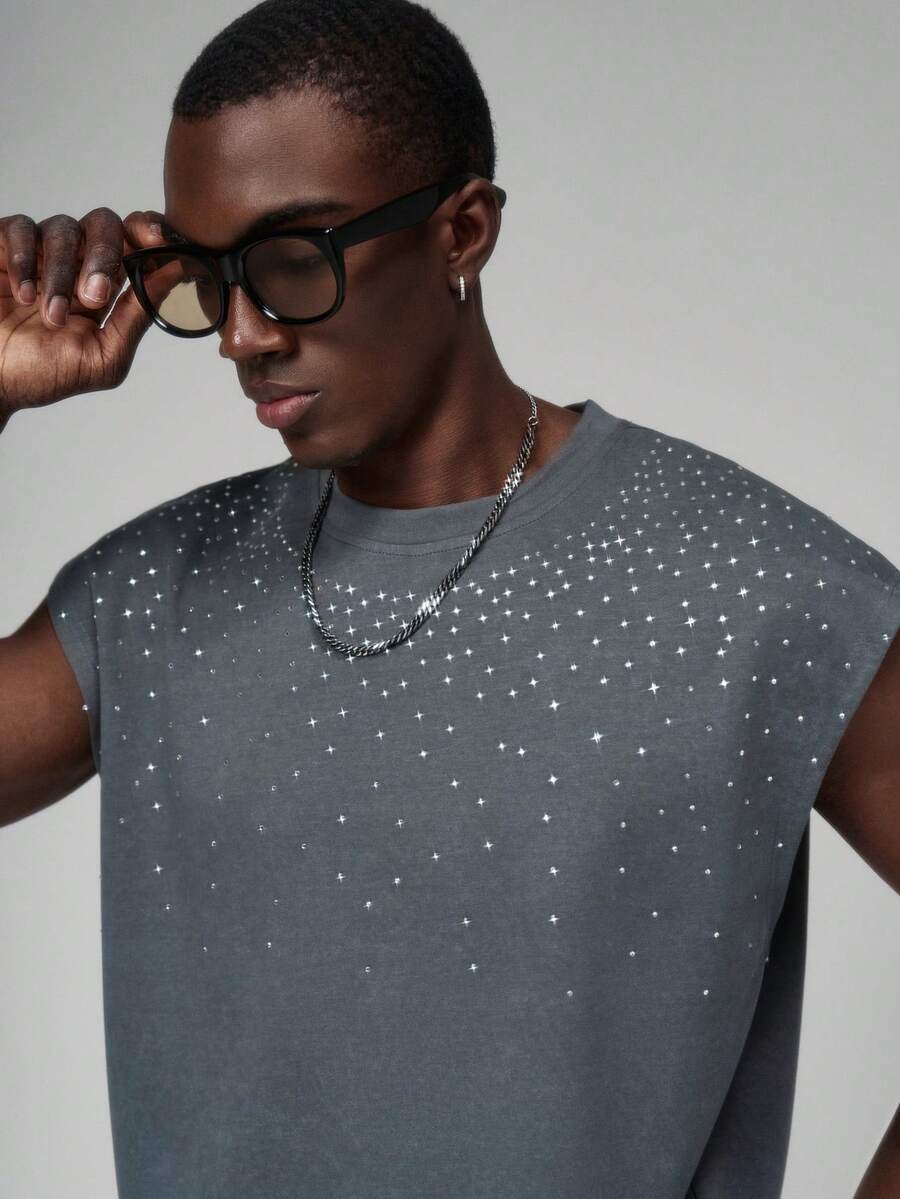 STYNVO Áo tank top nam cổ tròn, chất liệu dệt kim trơn, thoải mái, đính đá ngẫu nhiên, phù hợp cho các dịp thường ngày, công sở, kinh doanh, hẹn hò, giải trí, tiệc tùng, ăn tối. Có thể mặc riêng hoặc phối cùng trang phục thường ngày. Món quà tuyệt vời cho bạn bè. Áo thun không tay in hình, quần áo nam đính đá, áo thun nam dự tiệc. - Xám - Xem 1