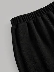 Girlism Bộ đồ thun cho bé gái tuổi teen, set 2 món phong cách thường ngày đi làm, áo tay phồng và quần ống loe dễ thương, áo và quần phối màu đen trắng. - Đen và trắng - Xem 4