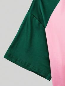 这套服装包含一件粉绿撞色短袖T恤，饰有蝴蝶结图案，搭配一条直筒宽松休闲裤。甜美与酷感混搭的风格适合日常穿着，搭配不同的配饰更能增添活力。 - 彩色 - 查看 4