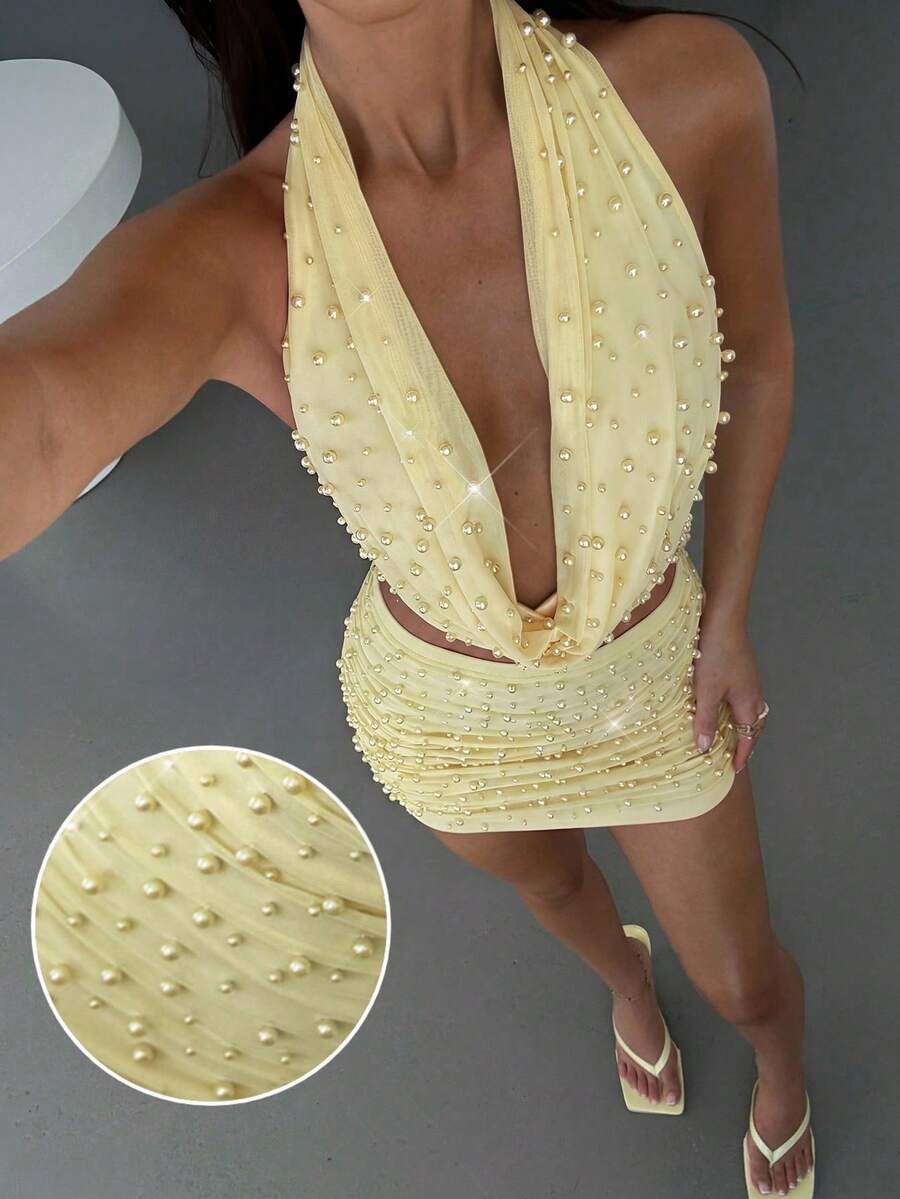 Aloruh Bộ đồ nữ mùa xuân/hè mới về, màu vàng nhạt trơn, gồm áo hai dây cổ khoét sâu gợi cảm và chân váy ngắn cạp thấp đính hạt, trang phục dự tiệc/đám cưới. - Vàng nhạt - Xem 1