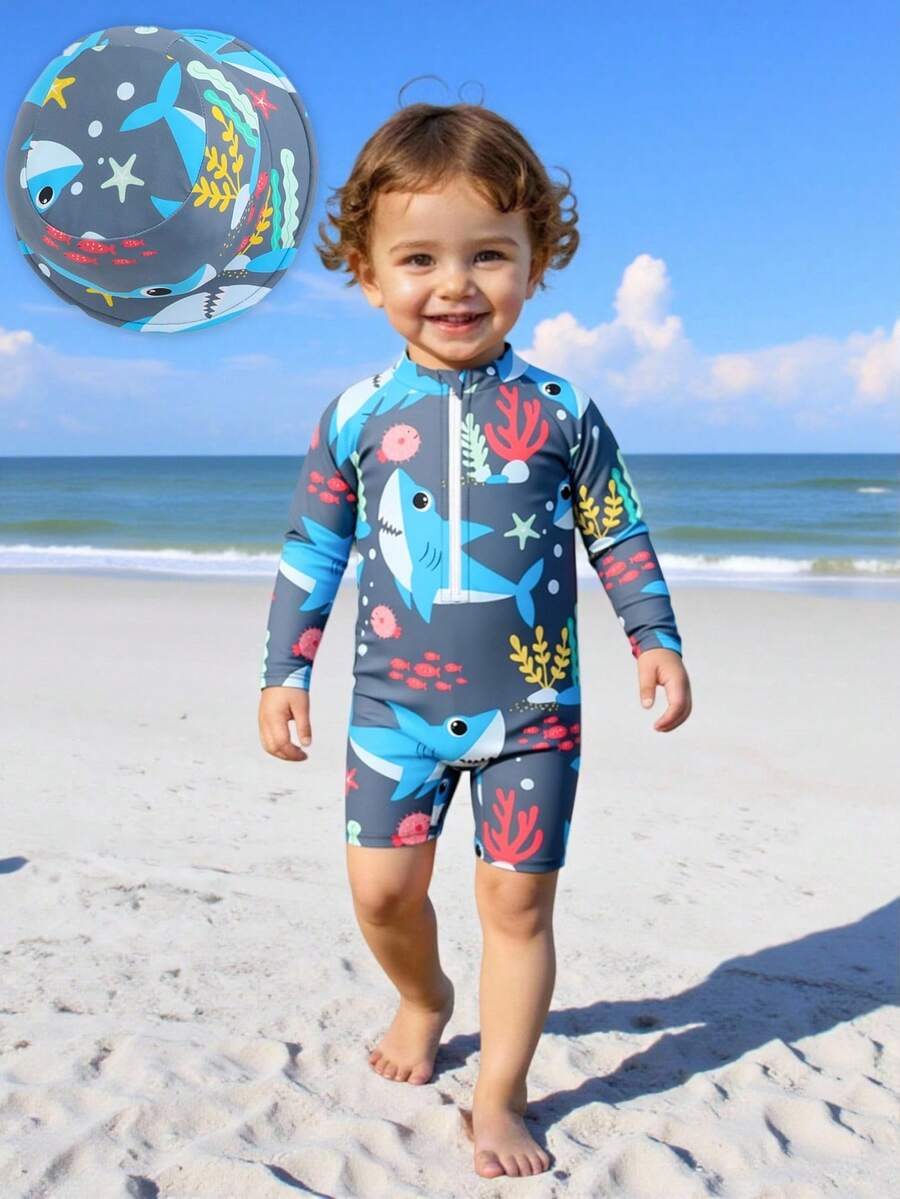 SHEIN 婴幼儿鲨鱼印花防晒衣,海洋生物印花沙滩装,泳衣,婴儿防护泳衣,儿童海洋生物潜水服。这款婴幼儿泳衣采用趣味十足的蓝色海洋生物印花设计,既时尚又实用。采用防紫外线面料,长袖连体设计,穿着舒适透气。可爱的鲨鱼卡通图案增添了一丝俏皮活力,是今夏海滩、泳池和水上活动的必备单品。 - 灰色 - 查看 1