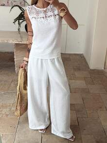 Livesso Bộ đồ nữ mùa xuân hè gồm áo tank top không tay phối ren rỗng, áo blouse trắng dáng rộng thích hợp cho công sở, ngày lễ tình nhân, đám cưới, kỳ nghỉ, đi biển, quần ống đứng thoải mái, bộ 2 món, bộ đồ mặc nhà thanh lịch dành cho nữ. - trắng - Xem 5